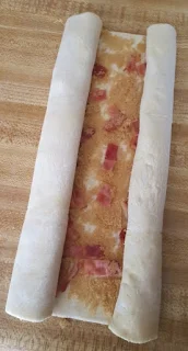 rolled pastry with bacon and brown sugar