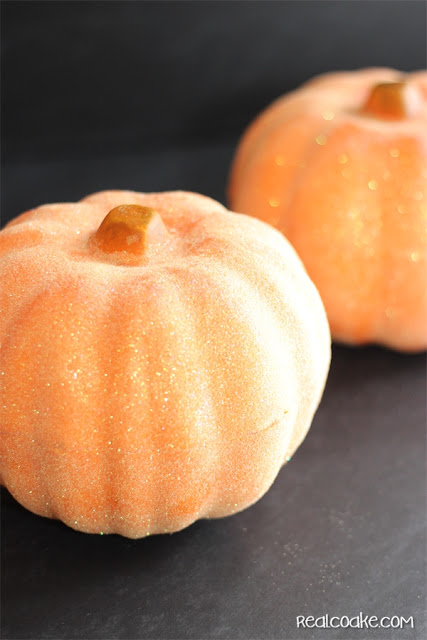 Easy DIY crafts using a dollar store pumpkin and transforming it with a little time and glitter from realcoake.com