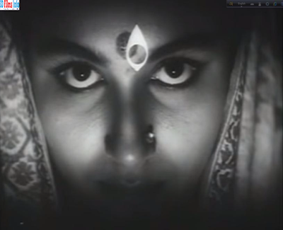 Film Aesthetics of Devi (1960) Directed By Satyajit Ray_BD Films Info সত্যজিৎ রায় পরিচালিত দেবী চলচ্চিত্রটির কাহিনী প্রভাত কুমার মুখোপাধ্যায়'-এর "দেবী" গল্প থেকে নেয়া। ১৭৯০ এর পটভূমিতে রচিত গল্পটি বড় পর্দায় ফুটে উঠেছে ১৮৬০ এর দশকের প্রেক্ষাপটে। ১৯৬০ সালে নির্মিত চলচ্চিত্রটি সর্বোত্তম বৈশিষ্ট্যপূর্ণ বাংলা ছায়াছবির জন্য রাষ্ট্রপতি রৌপ্য পদক লাভ করে। এছাড়াও ১৯৬২ সালে কান চলচ্চিত্র উৎসবে সর্বোচ্চ পদক পাম দি অরের জন্য মনোনীত হয়। ধর্মান্ধতার পাশাপাশি ধর্ম ও চিন্তার অস্পষ্টতা আর আচ্ছন্নতা, মনস্তাত্তিক টানাপোড়নের মাধ্যমে অসাধারণ এক ট্র্যাজেডির অবতারণা হয়েছে চলচ্চিত্রটিতে। Film Aesthetics of Devi (1960) Directed By Satyajit Ray_BD Films Info সত্যজিৎ রায় পরিচালিত দেবী চলচ্চিত্রটির কাহিনী প্রভাত কুমার মুখোপাধ্যায়'-এর "দেবী" গল্প থেকে নেয়া। ১৭৯০ এর পটভূমিতে রচিত গল্পটি বড় পর্দায় ফুটে উঠেছে ১৮৬০ এর দশকের প্রেক্ষাপটে। ১৯৬০ সালে নির্মিত চলচ্চিত্রটি সর্বোত্তম বৈশিষ্ট্যপূর্ণ বাংলা ছায়াছবির জন্য রাষ্ট্রপতি রৌপ্য পদক লাভ করে। এছাড়াও ১৯৬২ সালে কান চলচ্চিত্র উৎসবে সর্বোচ্চ পদক পাম দি অরের জন্য মনোনীত হয়। ধর্মান্ধতার পাশাপাশি ধর্ম ও চিন্তার অস্পষ্টতা আর আচ্ছন্নতা, মনস্তাত্তিক টানাপোড়নের মাধ্যমে অসাধারণ এক ট্র্যাজেডির অবতারণা হয়েছে চলচ্চিত্রটিতে। Devi (1960) Film Poster, Directed By Satyajit Ray_BD Films Info    দেবী  সত্যজিৎ রায় পরিচালিত দেবী চলচ্চিত্রটির কাহিনী প্রভাত কুমার মুখোপাধ্যায়'-এর "দেবী" গল্প থেকে নেয়া।  ১৭৯০ এর পটভূমিতে রচিত গল্পটি বড় পর্দায় ফুটে উঠেছে ১৮৬০ এর দশকের প্রেক্ষাপটে। ১৯৬০ সালে নির্মিত চলচ্চিত্রটি সর্বোত্তম বৈশিষ্ট্যপূর্ণ বাংলা ছায়াছবির জন্য রাষ্ট্রপতি রৌপ্য পদক লাভ করে। এছাড়াও ১৯৬২ সালে কান চলচ্চিত্র উৎসবে সর্বোচ্চ পদক পাম দি অরের জন্য মনোনীত হয়। ধর্মান্ধতার পাশাপাশি ধর্ম ও চিন্তার অস্পষ্টতা আর আচ্ছন্নতা, মনস্তাত্তিক টানাপোড়নের মাধ্যমে অসাধারণ এক ট্র্যাজেডির অবতারণা হয়েছে চলচ্চিত্রটিতে।     দেবী কাহিনী সংক্ষেপ:-  উনিশ শতকে বাংলার এক গ্রাম চাঁদপুরের জমিদার পরিবারের গৃহবধূ দয়াময়ীকে ঘিরে গল্পের বিস্তার। সে থাকে তার স্বামী উমাপ্রসাদ, উমাপ্রসাদের বাবা কালিকিঙ্কর, বড় ভাই তারাপ্রসাদ ও তার স্ত্রী হরসুন্দরী আর তাদের ছেলে খোকার সাথে একই বাড়িতে। গ্রামের জমিদার কালিকিঙ্কর  এক দিকে যেমন বিদ্বান অন্যদিকে কালীদেবীর ভক্ত। স্নেহময়ী দয়াময়ী শ্বশুর আর শ্বশুরবাড়িকে ভালভাবেই আগলে রাখে। একদিন রাতে কালিকিঙ্কর স্বপ্নে দেখেন তার স্নেহময়ী পুত্রবধূ দয়াময়ীকে দেবী কালীর রূপে। এই স্বপ্নকে সত্যি ভেবে তিনি দয়াময়ীর পায়ে লুটিয়ে পরেন এবং তাকে দেবী হিসেবে পূজা করতে শুরু করেন। প্রথমে দয়াময়ী এই ক্ষমতা মেনে নিতে পারেনি। কিন্তু একদিন এক মৃতপ্রায় বালকের জীবন তার কাছে কাকতালীয়ভাবে বেঁচে গেলে সবাই তাকে দেবী হিসেবে মেনে নিতে থাকে। এক সময় সে নিজেও স্বীকার করে নেয় তার মাঝে ঐশ্বরিক শক্তি আছে। অবশেষে তার হাতে প্রিয় খোকার মৃত্যু দিয়ে এই ধর্মান্ধতার করুণ পরিণতি লাভ করে। ফলাফল পাগলপ্রায় দেবী মিলিয়ে যায় অজানায়।          দেবী চলচ্চিত্রের সামাজিক, রাজনৈতিক ও ঐতিহাসিক পটভূমি বিশ্লেষণ:-  পরিচালক সত্যজিৎ রায় এমন একটি সময়কালকে তুলে ধরেছেন চলচ্চিত্রে যেখানে একদিকে দেখা যায় কুসংস্কারাচ্ছন্ন বিদ্বান ব্যক্তিত্ব, অন্যদিকে কুসংস্কার বর্জিত আধুনিক চিন্তা ধারণ করা বিদ্বান ব্যক্তিত্ব। প্রথম জন উমাপ্রসাদের বাবা কালিকিঙ্কর, দ্বিতীয় জন উমাপ্রসাদ। আর সময়টি উনবিংশ শতাব্দীর মাঝামাঝি সময়কাল নিয়ে আবর্তিত। এই সময়ে এই দুই মানসিকতার প্রবণতা সমাজে তথা পুরো রাষ্ট্রে দেখা যেত। তাইতো উমাপ্রসাদের উক্তিতে যেমন উঠে আসে তার বাবা বিদ্বান হলেও সেকেলে একইভাবে ইংরেজি শিক্ষা নেয়া উমাপ্রসাদের প্রসঙ্গে দয়াময়ীকে বলেন "তোমার কেরেসটান স্বামী"। কারণ তৎকালীন সময়ে ইংরেজি চর্চা প্রাচীনদের কাছে খ্রিস্টান চর্চার শামিল ছিল। এভাবেই সেই সময়কালে সমাজের প্রাচীন অর্বাচীনের চিন্তা ধারার বিস্তর ফারাক এই পরিবারের গল্পটিতে উঠে এসেছে।  তৎকালীন নারী সমাজের একটি চিত্র উঠে এসেছে এই চলচ্চিত্রে। এই পরিবারের দুই নারী চরিত্র হরসুন্দরী ও দয়াময়ীকে সমান্তরালে রেখে পরিচালক দুই ধরনের নারী চরিত্রের বৈশিষ্ট্য ফুটিয়ে তুলেছেন। হরসুন্দরী ছিল প্রতিবাদী নারীসত্ত্বার প্রতীক অপরদিকে দয়াময়ী চিরায়ত ভীরু ও নিপীড়িত সত্ত্বার প্রতীক। সেই সময়কালটি যেহেতু ব্রিটিশ ঔপনিবেশিক আমল তখনকার কিছু নারীদের মাঝে ব্রিটিশ বিরোধী প্রতিবাদে যুক্ত হতে দেখা যেত। তারা সরাসরি না হলেও পরোক্ষভাবে এর প্রতিবাদ জানাত। আমরা যদি কালিকিঙ্করের চরিত্রটি দেখি তবে তাতে ব্রিটিশ শাসকদের ছাপ স্পষ্ট। তিনি ছিলেনও তাদেরই এক জমিদার। যার কথাই শেষ হিসেবে ধরা হত।  হরসুন্দরী তার বিপক্ষে সরাসরি না বললেও পরোক্ষভাবে তার সিদ্ধান্তের তীব্র সমালোচনাকারী ছিলেন। অন্যদিকে দয়াময়ী চিরায়ত নারী সমাজের সেই শোষিত অংশের প্রতিনিধিত্ব করে।   এভাবেই চারিত্রিক বৈপরীত্যের মাধ্যমে পরিচালক তৎকালীন সমাজ ব্যবস্থার চিত্র আর তার নতুন পথে অগ্রসরের চিন্হ এঁকেছেন।             প্লট বিভাজনঃ-   ১) কালিকিঙ্করের বাড়িতে দুর্গা পূজা উদযাপন   (ক) কালিকিঙ্করের বাড়িতে দুর্গা পূজা অর্চনা  (খ) বলি অনুষ্ঠান ও উমাপ্রসাদদের পূজা উদযাপন  (গ) দেবী দুর্গার বিসর্জন    ২) কালিকিঙ্করের স্বপ্নে কালী রূপে দয়াময়ীকে দর্শন  (ক) দয়াময়ী ও খোকার মাঝে শক্ত বন্ধন  (খ) কালিকিঙ্করের সেবা শুশ্রূষা করে দয়াময়ী  (গ) কালিকিঙ্করের স্বপ্নে কালী রূপে দয়াময়ীকে দর্শন    ৩) দয়াময়ীকে দেবী রূপে পূজা অর্চনা  (ক) কালিকিঙ্কর দয়াময়ীর পায়ে লুটিয়ে পড়ে  (খ) দেবী রূপে পূজা অর্চনা শুরু হয় দয়াময়ীর  (গ) দয়াময়ীর জন্য পৃথক ঘর দেয়া হয়  (ঘ) দয়াময়ীর ইচ্ছায় হরসুন্দরী উমাপ্রসাদকে কাছে চিঠি লিখে জ্ঞাত করে    ৪) দয়াময়ীর শক্তির প্রকাশ  (ক) দয়াময়ীর কাছে মুমূর্ষু নাতিকে বাঁচিয়ে তুলতে নিয়ে আসে এক বৃদ্ধ  (খ) শিশুটিকে দয়াময়ীর চরণামৃত খাওয়ানো হয়  (গ) উমাপ্রসাদ বাড়িতে ফিরে দয়াময়ীকে দেবীর আসনে দেখে  (ঘ) উমাপ্রসাদ আর কালিকিঙ্করের মাঝে বাকবিতণ্ডা  (ঙ) মুমূর্ষু শিশুটি বেঁচে উঠে  (চ) দয়াময়ীর শক্তির ব্যপারে কালিকিঙ্করের বিশ্বাস দৃঢ় হয়    ৫) উমাপ্রসাদ ও দয়াময়ীর বাড়ি থেকে পালানো  (ক) উমাপ্রসাদ দ্বিধান্বিত হয়ে পড়ে  (খ) দয়াময়ীকে উমাপ্রসাদ পালিয়ে গৃহ ত্যাগের জন্য রাজি করায়  (গ) দয়াময়ী এবং উমাপ্রসাদ বাড়ি ছেড়ে পালায়  (ঘ) মাঝপথে দয়াময়ী পালিয়ে যেতে অস্বীকৃতি জানায়    ৬) খোকার মৃত্যু  (ক) দয়াময়ীর পূজা অর্চনা চলতে থাকে  (খ) এক রাতে খোকা অসুস্থ হয়ে পড়ে  (গ) অসুস্থ খোকাকে কালিকিঙ্করের অজ্ঞাতে চিকিৎসক দেখান হরসুন্দরী  (ঘ) খোকাকে দয়াময়ীর কাছে নেয়া হয়  (ঙ) খোকাকে সুস্থ করতে দয়াময়ী রাতে তার কাছে রেখে দেয়  (চ) খোকার মৃত্যু    ৭) দয়াময়ীর অজানার উদ্দেশ্যে গৃহত্যাগ  (ক) উমাপ্রসাদ বাড়ি ফিরে জানতে পারে খোকার মৃত্যু সংবাদ  (খ) কালিকিঙ্করকে খোকার মৃত্যুর জন্য দায়ী করে উমাপ্রসাদ  (গ) দয়াময়ীকে নিয়ে যেতে উদ্যত হয় সে  (ঘ) নিজ ঘরে পাগল প্রায় দয়াময়ীকে দেখতে পায় উমাপ্রসাদ  (ঙ) তার কাছে বাঁচার আকুতি জানায় দয়াময়ী  (চ) কুয়াশাচ্ছন্ন মাঠে অজানায় মিলিয়ে যায় দয়াময়ী    প্লট বিশ্লেষণঃ  দেবী চলচ্চিত্রের শুরু হয় জমিদার বাড়িতে দুর্গা পূজা উদযাপনের মধ্য দিয়ে। উমাপ্রসাদের কলকাতা যাত্রা আর কালিকিঙ্করের স্বপ্ন দর্শনের মাধ্যমে দয়াময়ীকে পূজা করার মাধ্যমে চলচ্চিত্রটি এগিয়ে যেতে থাকে। এরপর একটি শিশু কাকতালীয়ভাবে দয়াময়ীর কাছে বেঁচে উঠে। যার ফলে তার দেবত্ব ভাবের বিস্তার লাভ করে। নিজ শিক্ষা আর সেই সাথে গুরুজনেরর কুসংস্কারের মধ্যে বিভক্ত হয়ে পড়ে উমাপ্রসাদ। দয়াময়ীও নিজ ক্ষমতার মিথ্যা আশ্বাসে বাঁচতে শুরু করে। ফলাফল প্রত্যক্ষভাবে তার হাতে আদরের খোকার মৃত্যুর জন্য পরোক্ষভাবে দায়ী থাকে একটি পরিবার তথা পুরো একটি সমাজ ও গোষ্ঠীর কুসংস্কার আর অন্ধ বিশ্বাস। ফলে আরোপিত দেবীর ভাগ্যেও জোটে বিসর্জনের পরিণতি।    চরিত্রগুলোর মনস্তত্ত্ব বিশ্লেষণ-  দেবী চলচ্চিত্র শুধুমাত্র ধর্মান্ধতা নিয়ে নয়। এটি একই সাথে মনস্তাত্ত্বিক চলচ্চিত্রও। প্রতিটি চরিত্র এখানে বিশেষ বৈশিষ্ট্য নিয়ে সমাজের বিভিন্ন মানসিকতার ব্যক্তিত্ব তুলে ধরেছে। এখানেই পরিচালকের সার্থকতা ও দেবীর নান্দনিকতার প্রকাশ পায়।  এখানে চরিত্রগুলোর মনস্তাত্ত্বিক চিন্তা চেতনার বিশ্লেষণ তুলে ধরা হল।    কালিকিঙ্কর-  কালিকিঙ্কর অন্যতম মূল চরিত্র এই চলচ্চিত্রের। জমিদার ও ভুমিপতি এই ব্যক্তি তার কুসংস্কার ও অন্ধ বিশ্বাসে দৃঢ় চেতন। তার বাড়িতে অধিষ্ঠিত দেবী কালীর নিয়মিত আরাধনা করে সে। সেই  সাথে ঘটা করে দুর্গা পুজাও করে বাড়িতে। তার ছোট পুত্রবধূ দয়াময়ী তার বিশেষ স্নেহভাজন সেই সাথে তাকে সে নিজের মা বলেই ডাকে, যেমনটা সে মনে করে থাকে তার অধিষ্ঠিত দেবী কালী্র ক্ষেত্রেও। তার মনের এই সুপ্ত ইচ্ছাটি স্বপ্নের মাধ্যমে উঠে আসে। এর বিশ্লেষণ আমরা পাই মনোবিজ্ঞানী ফ্রয়েডের কাছ থেকে। তার মতে-"Dreams are the fulfillment of wishes, and sometimes that dreams represent the fulfillment of wishes."  এই কথাটিকে আমরা যদি চলচ্চিত্রটির প্রেক্ষিতে দেখি তবে আরও স্পষ্ট উল্লেখ পাই কালিকিঙ্করের উক্তির মধ্য দিয়ে। সে একদিকে দয়াময়ীকে দিয়ে পা মালিশ করায় অন্য দিকে বলে তার মা অর্থাৎ দয়ার জন্যই সে সন্ন্যাস গ্রহণ করেনি। এই যে দয়াময়ীকে নিজের মা হিসেবে দেখতে চাওয়ার যে আকাঙ্ক্ষা তা থেকেই স্বপ্নে তাকে দেবী রূপে দর্শন।  আবার তার কুলপতি ও একরোখা মনোভাবের জন্যই সে খোকার মৃত্যুর পরও তার আরোপিত দেবীভাবের সংস্কারের কুফল মেনে নেয়নি। এমনকি তার প্রিয় পুত্রবধূর অসহায় অবস্থাও তার সিদ্ধান্তের কোন চ্যুতি ঘটাতে পারেনি। বিদ্বান কিন্তু ধর্মান্ধ এক দৃঢ় স্বৈরাচারী জমিদারের চরিত্র বলা যেতে পারে কালিকিঙ্করকে।    উমাপ্রসাদ-  কালিকিঙ্করের কনিষ্ঠ পুত্র উমাপ্রসাদের সাথে তার বাবার ফারাক এক যুগের। সেই সাথে তাদের চিন্তা-চেতনা, শিক্ষা, সংস্কারও ভিন্ন। সত্যজিৎ রায় একটি ইন্টারভিউতে বলেছেন যে এই চরিত্রটি সময়ের সাথে সাথে দৃঢ় হয়েছে। তার কথার সত্যতা আমরা খুঁজে পাই চলচ্চিত্রে।  প্রথমে আমরা লক্ষ্য করি এমন এক উমাপ্রসাদকে যে কিনা ইংরেজি শিক্ষার দাম্ভিকতায় তার বাবাকে সেকেল বলে আখ্যা দেয়। অথচ বিধবা বিবাহে সমর্থন দেয়া, রাজা রামমোহন রায়ের প্রতি সুদৃষ্টি রাখা আধুনিক চিন্তার এই যুবকই নিজের স্ত্রীয়ের উপর হওয়া মানসিক অত্যাচারের বিরুদ্ধে কথা বলতে পারেনি। এমনকি এক সময় সে নিজেও কেমন দ্বিধান্বিত হয়ে পড়ে দয়ার দেবত্ব নিয়ে। তার কিশোরী স্ত্রী যখন তার সাথে পালিয়ে যেতে অস্বীকৃতি জানায় সে তখন তাকে বোঝানোর মত ব্যক্তিত্ব রাখে না।  কিন্তু তার দৃঢ়চেতা ব্যক্তিত্বের প্রকাশ দেখতে পাই খোকার মৃত্যু সংবাদ পাওয়ার পর যখন সে পিতার বিরুদ্ধে কথা বলে। এর পূর্ব পর্যন্ত পিতার অন্যায়ের বিপক্ষে তাকে দৃঢ় অবস্থান নিতে দেখা যায়নি। সময়ের সাথে সাথেই তার চারিত্রিক শক্তির দৃঢ়তা অর্জিত হয়। দুর্ভাগ্যজনক বাবার সাথে লড়াই করেও সে তার প্রিয়তমা স্ত্রীকে বাঁচাতে পারে না।    দয়াময়ী-  সতের বছরের কিশোরী গৃহবধূ দয়াময়ীর চরিত্রটি নিতান্তই সাধারণ ও চিরাচরিত নারীর প্রতিনিধি। খুব বেশি পড়ালেখা না জানা সংসারব্রত পালন করা এক নারী চরিত্র এটি। আমাদের সাধারণ নারীদেরই যে বিভিন্ন রূপ সেটি দেখা যায় তার মাঝে। যেমন- খোকার কাছে সে মায়ের মত সেই সাথে খেলার সাথী, উমাপ্রসাদের কাছে প্রিয়তমা স্ত্রী আর কালিকিঙ্করের কাছে একই সাথে স্নেহময়ী মেয়ে আবার মমতাময়ী মায়ের মত। এখানে লক্ষ্যনীয় বিষয় হল যে যে পুরুষ তাকে যেভাবে দেখতে চায় সে তাকে সেই রূপেই তুলে ধরে। যার ফলে এক সাধারণ ও ক্ষমতাহীন (অর্থনৈতিক, সামাজিক ও মানসিক দৃঢ়তাহীন) দয়াময়ীর উপর দেবত্ব চাপিয়ে দেয়া হয় সে চুপ করে থাকে। নিজের অবস্থান জানাতে পারে না।  এই চরিত্রটির অন্য স্তর দেখি আমরা তখন যখন কিনা সে নিজ ক্ষমতার উপর বিশ্বাস করতে শুরু করে বা তার মধ্যে দেবত্ব পাওয়ার লোভ প্রকাশ পায়। এই কারনেই সে উমাপ্রসাদের সাথে পালিয়ে যেতে বাধা দেয়। এমনকি তার প্রিয় খোকার অসুখে নিজ দেবত্ব জাহির করতে গিয়ে তাকে নিজের কাছে রেখে দেয়। ফলাফল তার হাতে খোকার মৃত্যু। শেষ দৃশ্যে আমরা তার পাগলপ্রায় অবস্থাটা লক্ষ্য করলে দেখি তার মাঝে খোকার মৃত্যু শোক নেই বরং নিজেকে বাঁচানোর তাগিদ।  এভাবেই এক সাধারণ কিশোরী গৃহবধূ যখন বিশেষ ক্ষমতা পায় তার মধ্য দিয়ে তার মনস্তাত্ত্বিক বিভিন্ন স্তর উঠে আসে। এক দিকে স্বামীর স্মৃতিতে অশ্রু ঝরায় তো অপরদিকে স্বামীর সাথে ঘর ছাড়তে অস্বীকৃতি জানায়।    হরসুন্দরী-  এই চলচ্চিত্রের সবচেয়ে সক্রিয় ও প্রতিবাদী চরিত্র হল বাড়ির বড় বউ হরসুন্দরী। যেখানে দয়াময়ী কুসংস্কারাচ্ছন্ন শ্বশুরের হাতের পুতুল সেখানে হরসুন্দরী হল সংস্কারের বিরুদ্ধে কথা বলা এক নারী। চলচ্চিত্রটির সময়কাল এমন এক যুগের যেখানে পুরুষতান্ত্রিক সমাজ ব্যবস্থা প্রবল, সেই যুগে কোন নারীর এতটা দৃঢ় ব্যক্তিত্ব স্বাভাবিকভাবেই প্রশংসার দাবি রাখে। কিন্তু দুঃখের বিষয় হল চরিত্রটি শেষ পর্যন্ত এই ব্যক্তিত্ব ধরে রাখতে ব্যর্থ হয়।  দয়াময়ীকে যখন সবাই দেবী হিসেবে মেনে নেয় তখন এর বিরোধিতা করা একমাত্র ব্যক্তি ছিল হরসুন্দরী। এমনকি সে তার স্বামীকেও এ ব্যপারটি মেনে নেয়ার জন্য ভর্ৎসনা জানায়। এর পিছনে হয়তোবা মানব মনের সাধারণ হিংসা প্রবৃত্তিও থাকতে পারে। কেননা চলচ্চিত্রের প্রথম থেকেই আমরা দেখি সবার প্রিয় ছিল দয়াময়ী। তার সাথে সবারই কেমন যেন দূরত্ব। দয়াময়ীর উপর দেবত্ব আরোপের পর সবাই তার পূজা করতে থাকে। কিন্তু সে যেমন ছিল তেমনি রয়ে যায়।  দয়াময়ী আলাদা নিচে ঘর পাওয়ার পর তার উক্তি "তোর তো ভালই হল উপর নিচ করতে হবে না"- এর মধ্য দিয়েও একটি সুক্ষ্ম খোঁচা পরিলক্ষিত হয়।  শেষে এসে দয়াময়ীকে রাক্ষুসী আখ্যা দিয়ে সে যেন তার আগের অবস্থানের বরখেলাপ করে।    তারাপ্রসাদ-  দেবী চলচ্চিত্রের সবচেয়ে নিস্ক্রিয় চরিত্র হল উমাপ্রসাদের বড় ভাই তারাপ্রসাদ। তাকে দেখা যায় তার বাবার শাসনের ছায়ায় থাকা এক ব্যক্তি যার নিজের কোন রায় নেই। সে মাতাল অবস্থায় নিজের হুঁশ রাখতে পারে না। তার স্ত্রী তাকে ভর্ৎসনা করলেও সে সঠিক পথে চলে না। চরিত্রটি এতটাই নির্লিপ্ত যে তার পুত্রের অসুখের সময় সঠিক সিদ্ধান্ত পর্যন্ত নিতে পারে না পাছে তার বাবার বিরুদ্ধে না তা চলে যায়।  তারাপ্রসাদের চরিত্রটির মানসিকতা সমাজের বুদ্ধি বিবেকহীন মেরুদণ্ডহীন পুরুষদের প্রতিনিধি।      ভিজ্যুয়াল উপাদানের মাধ্যমে দেবী চলচ্চিত্রের নান্দনিকতা বিশ্লেষণঃ  ভিজ্যুয়াল উপাদান যেমন ফ্রেম, আলো, শব্দ প্রভৃতির নান্দনিক ও যথাযথ ব্যবহারের মাধ্যমে দেবী চলচ্চিত্রটি অসাধারণ ভিজ্যুয়াল আস্পেক্ট তৈরি করেছে। উপাদানগুলোর মাধ্যমে শুধুমাত্র বাহ্যিক নয় অন্তর্গত অর্থ ও ফুটে উঠেছে। এখানে দেবীর কয়েকটি দৃশ্য ও ফ্রেমের মাধ্যমে ভিজ্যুয়াল উপাদানগুলোর ব্যবহার আর তার অন্তর্নিহিত অর্থ তুলে ধরা হল-   প্রথমে পূজা উদযাপনের দৃশ্যে বেশ কিছু গুরুত্বপূর্ণ ফ্রেম পাওয়া যায়। যেমন- পূজা অর্চনার সময় বিরাট দুর্গা প্রতিমার সামনে কালিকিঙ্করের অবস্থান দেখে মনে হয় প্রতিমাটি যেন তাকে গ্রাস করে নিচ্ছে। এর মাধ্যমে আমরা এই তথ্যটিই পাই যে ধর্মচর্চার আতিশয্যে কালিকিঙ্কর পিষ্ট। আলোক ব্যবস্থাপনার ক্ষেত্রেও ফ্রেমটিতে এই তথ্যই উঠে আসে। সেখানে দুর্গা প্রতিমার আলোতে অবস্থান আর কালিকিঙ্করকে অন্ধকারে রাখার মাধ্যমে আলোর সামনে থেকেও তার মাঝের ধর্মান্ধতার অভিশাপ তুলে ধরা হয়েছে।  Film Aesthetics of Devi (1960) Directed By Satyajit Ray_BD Films Info দেবী  সত্যজিৎ রায় পরিচালিত দেবী চলচ্চিত্রটির কাহিনী প্রভাত কুমার মুখোপাধ্যায়'-এর "দেবী" গল্প থেকে নেয়া।  ১৭৯০ এর পটভূমিতে রচিত গল্পটি বড় পর্দায় ফুটে উঠেছে ১৮৬০ এর দশকের প্রেক্ষাপটে। ১৯৬০ সালে নির্মিত চলচ্চিত্রটি সর্বোত্তম বৈশিষ্ট্যপূর্ণ বাংলা ছায়াছবির জন্য রাষ্ট্রপতি রৌপ্য পদক লাভ করে। এছাড়াও ১৯৬২ সালে কান চলচ্চিত্র উৎসবে সর্বোচ্চ পদক পাম দি অরের জন্য মনোনীত হয়। ধর্মান্ধতার পাশাপাশি ধর্ম ও চিন্তার অস্পষ্টতা আর আচ্ছন্নতা, মনস্তাত্তিক টানাপোড়নের মাধ্যমে অসাধারণ এক ট্র্যাজেডির অবতারণা হয়েছে চলচ্চিত্রটিতে।   Devi (1960) Directed By Satyajit Ray_BD Films Info                           দুর্গা প্রতিমার সামনে কালিকিঙ্করের পূজা অর্চনা    আবার বলির দৃশ্যটিতে দেখা যায় পরিচালক সরাসরি বলির দৃশ্য না দেখিয়ে সেটিকে আতশবাজির দৃশ্য দিয়ে প্রতিস্থাপন করেছেন। আতশবাজির দৃশ্যটি খুবই তাৎপর্যপূর্ণ একটি দৃশ্য। বলির উদ্দেশ্য হল ত্যাগের মাধ্যমে সকল পশুত্ব ও পাপকে দূরীভূত করা। এই দৃশ্যে সরাসরি বলির দৃশ্যের রক্তপাতের পরিবর্তে যেমন একটা উদযাপনের মুড সৃষ্টি করা হয়েছে সেই সাথে অন্ধকার আকাশে আতশবাজির আলোর স্ফুটন যেন সব আঁধারকে সব পাপকে দূরীভূত করে দিয়ে চার দিকে ছড়িয়ে যাচ্ছে।      আতশবাজির আলোকচ্ছটা: দেবী (১৯৬০)  Film Aesthetics of Devi (1960) Directed By Satyajit Ray_BD Films Info দেবী  সত্যজিৎ রায় পরিচালিত দেবী চলচ্চিত্রটির কাহিনী প্রভাত কুমার মুখোপাধ্যায়'-এর "দেবী" গল্প থেকে নেয়া।  ১৭৯০ এর পটভূমিতে রচিত গল্পটি বড় পর্দায় ফুটে উঠেছে ১৮৬০ এর দশকের প্রেক্ষাপটে। ১৯৬০ সালে নির্মিত চলচ্চিত্রটি সর্বোত্তম বৈশিষ্ট্যপূর্ণ বাংলা ছায়াছবির জন্য রাষ্ট্রপতি রৌপ্য পদক লাভ করে। এছাড়াও ১৯৬২ সালে কান চলচ্চিত্র উৎসবে সর্বোচ্চ পদক পাম দি অরের জন্য মনোনীত হয়। ধর্মান্ধতার পাশাপাশি ধর্ম ও চিন্তার অস্পষ্টতা আর আচ্ছন্নতা, মনস্তাত্তিক টানাপোড়নের মাধ্যমে অসাধারণ এক ট্র্যাজেডির অবতারণা হয়েছে চলচ্চিত্রটিতে।    বলির দৃশ্য :দেবী (১৯৬০)                    কালিকিঙ্করের দয়াময়ীকে দেবী রূপে স্বপ্ন দর্শনের দৃশ্যটির পর্যালোচনা করলে সেখানে ত্রিনয়ন দয়াময়ীর দুই চোখ আর টিপ দিয়ে প্রতিস্থাপিত হয়। দৃশ্যের শুরুতে অন্ধকারে তিনটি চোখ দেখা যায় পড়ে তা ধীরে ধীরে দয়াময়ীর ত্রিনয়নে পরিনত হয়। অন্ধকারে তিনটি চোখ কালী দেবীরই ইঙ্গিত দেয়। তৃতীয় চোখ মুলত ধ্বংসের প্রতিনিধি। মানুষ হিসেবে দয়াময়ীর দুটি চোখ দেখানোই স্বাভাবিক ছিল। কিন্তু এই তৃতীয় চোখ দেখানোর ফলে দয়াময়ীর মাধ্যমে কোন কিছুর বিনাশের সংকেত দেয়। ফলাফল দেখি যখন তার হাতে খোকার মৃত্যু হয়। এখানে আলো ছায়ার অসাধারণ ব্যবহারের ফলে একটি রহস্যময় পরিবেশ সৃষ্টি হয়েছে।          Film Aesthetics of Devi (1960) Directed By Satyajit Ray_BD Films Info দেবী  সত্যজিৎ রায় পরিচালিত দেবী চলচ্চিত্রটির কাহিনী প্রভাত কুমার মুখোপাধ্যায়'-এর "দেবী" গল্প থেকে নেয়া।  ১৭৯০ এর পটভূমিতে রচিত গল্পটি বড় পর্দায় ফুটে উঠেছে ১৮৬০ এর দশকের প্রেক্ষাপটে। ১৯৬০ সালে নির্মিত চলচ্চিত্রটি সর্বোত্তম বৈশিষ্ট্যপূর্ণ বাংলা ছায়াছবির জন্য রাষ্ট্রপতি রৌপ্য পদক লাভ করে। এছাড়াও ১৯৬২ সালে কান চলচ্চিত্র উৎসবে সর্বোচ্চ পদক পাম দি অরের জন্য মনোনীত হয়। ধর্মান্ধতার পাশাপাশি ধর্ম ও চিন্তার অস্পষ্টতা আর আচ্ছন্নতা, মনস্তাত্তিক টানাপোড়নের মাধ্যমে অসাধারণ এক ট্র্যাজেডির অবতারণা হয়েছে চলচ্চিত্রটিতে।    কালিকিঙ্করের দয়াময়ীকে দেবী রূপে স্বপ্ন দর্শন: দেবী (১৯৬০)    শেষ সিকুয়েন্সে যখন উমাপ্রসাদ দয়াময়ীকে ফিরিয়ে নিতে আসে তখন তাদের ঘরটি তীব্র আলোয় পূর্ণ থাকে। এটি এক ধরনের পরাবাস্তব পরিবেশ তৈরি করে। প্রচুর আলোকচ্ছটার মাঝে যেন দয়ার আবির্ভাব হয় উমার সামনে। দয়া যে আর উমাপ্রসাদের স্ত্রী হিসেবে নেই তাদের মধ্যকার দূরত্ব এখানে স্পষ্ট ফুটে উঠেছে। তার সাজ পোশাক বা ব্যবহারের মধ্যেও সেই অসঙ্গতি লক্ষ্য করা যায়। সে যে নিজেও তার দেবত্বের স্বীকৃতি দিচ্ছে এ যেন তারই প্রমাণ।    Film Aesthetics of Devi (1960) Directed By Satyajit Ray_BD Films Info দেবী  সত্যজিৎ রায় পরিচালিত দেবী চলচ্চিত্রটির কাহিনী প্রভাত কুমার মুখোপাধ্যায়'-এর "দেবী" গল্প থেকে নেয়া।  ১৭৯০ এর পটভূমিতে রচিত গল্পটি বড় পর্দায় ফুটে উঠেছে ১৮৬০ এর দশকের প্রেক্ষাপটে। ১৯৬০ সালে নির্মিত চলচ্চিত্রটি সর্বোত্তম বৈশিষ্ট্যপূর্ণ বাংলা ছায়াছবির জন্য রাষ্ট্রপতি রৌপ্য পদক লাভ করে। এছাড়াও ১৯৬২ সালে কান চলচ্চিত্র উৎসবে সর্বোচ্চ পদক পাম দি অরের জন্য মনোনীত হয়। ধর্মান্ধতার পাশাপাশি ধর্ম ও চিন্তার অস্পষ্টতা আর আচ্ছন্নতা, মনস্তাত্তিক টানাপোড়নের মাধ্যমে অসাধারণ এক ট্র্যাজেডির অবতারণা হয়েছে চলচ্চিত্রটিতে।   তীব্র আলোর মাঝে দয়ার আবির্ভাব: দেবী (১৯৬০)    সর্বশেষ দৃশ্যে যেখানে দয়াময়ীর প্রস্থান দেখানো হয়েছে সেই ফ্রেমটি ভীষণ তাৎপর্য রাখে। তার করুণ পরিণতির গন্তব্য যে কোন অজানার পথে সেটিকে দয়াময়ীর অন্তর্ধান হিসেবেই তুলে ধরা যায়। এ যেন চিরায়ত নারীদেরই শেষ পরিণতির ইঙ্গিত দেয় যাদের নাকি সমাজের সংস্কারের বলি হতে হয়, তাদের গন্তব্য হয় ঠিকানাহীন হারানোর দেশে।   Film Aesthetics of Devi (1960) Directed By Satyajit Ray_BD Films Info দেবী  সত্যজিৎ রায় পরিচালিত দেবী চলচ্চিত্রটির কাহিনী প্রভাত কুমার মুখোপাধ্যায়'-এর "দেবী" গল্প থেকে নেয়া।  ১৭৯০ এর পটভূমিতে রচিত গল্পটি বড় পর্দায় ফুটে উঠেছে ১৮৬০ এর দশকের প্রেক্ষাপটে। ১৯৬০ সালে নির্মিত চলচ্চিত্রটি সর্বোত্তম বৈশিষ্ট্যপূর্ণ বাংলা ছায়াছবির জন্য রাষ্ট্রপতি রৌপ্য পদক লাভ করে। এছাড়াও ১৯৬২ সালে কান চলচ্চিত্র উৎসবে সর্বোচ্চ পদক পাম দি অরের জন্য মনোনীত হয়। ধর্মান্ধতার পাশাপাশি ধর্ম ও চিন্তার অস্পষ্টতা আর আচ্ছন্নতা, মনস্তাত্তিক টানাপোড়নের মাধ্যমে অসাধারণ এক ট্র্যাজেডির অবতারণা হয়েছে চলচ্চিত্রটিতে।    দয়াময়ীর অজানার উদ্দেশ্যে প্রস্থান: দেবী (১৯৬০)     দেবীকে শুধুমাত্র ধর্মান্ধতার বিরুদ্ধে তুলে ধরা কোন চলচ্চিত্র বললে ভুল হবে। সত্যজিৎ রায় এখানে পুরো একটি সমাজের, একটি সময়কালের অংশ ব্যক্তিজীবনের পারিবারিক, মনস্তাত্ত্বিক, সামাজিক প্রভৃতি সম্পর্কগুলো দেখিয়েছেন। যার ফলে দুই প্রজন্মের চিন্তা চেতনা, আবেগ এমনকি ধর্মচর্চার যে বিস্তর ফারাক সেটি এই চলচ্চিত্রে উঠে এসেছে। একই সাথে যে কোন বিষয়ে অস্পষ্ট ধারনা থেকে যে আবেশ বা অবসেশন তৈরি হয় তার পরিনাম কত ভয়াবহ হতে পারে সেই বার্তাটিই তিনি দেবীর মাধ্যমে উপস্থাপন করেছেন। Read More...