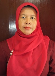 Dra. Hj. Nurasiah, M.Si