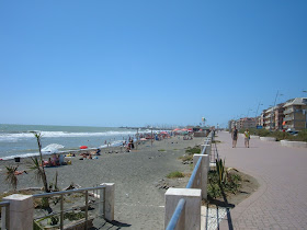 The beach at Ostia Lido attracts many visitors from nearby Rome during the summer months