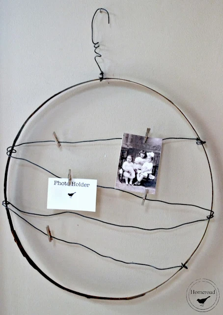 barrel strap photo holder with photos and clothespins