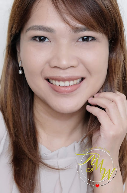 a photo of Estee Lauder Pure Color Envy Liquid Vinyl review in shade 308 Not So Innocent by Nikki Tiu of www.askmewhats.com
