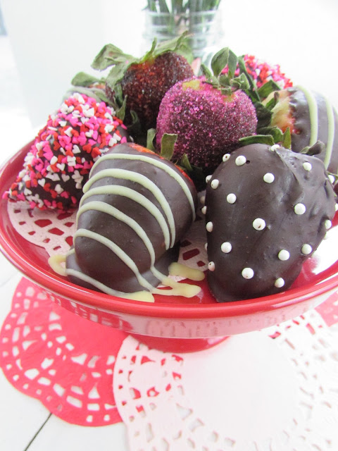 chocolate covered strawberries on a plate