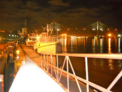 YA docked in the Savannah River at night.  Lots of lights!