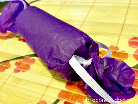 Save your toilet paper rolls to make these Wedding Popper Favors. Get the tutorial at www.abrideonabudget.com.