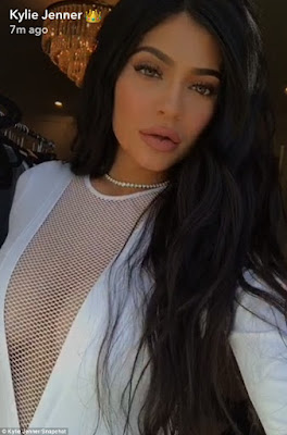 Kylie Jenner shows off massive cleavage in mesh top