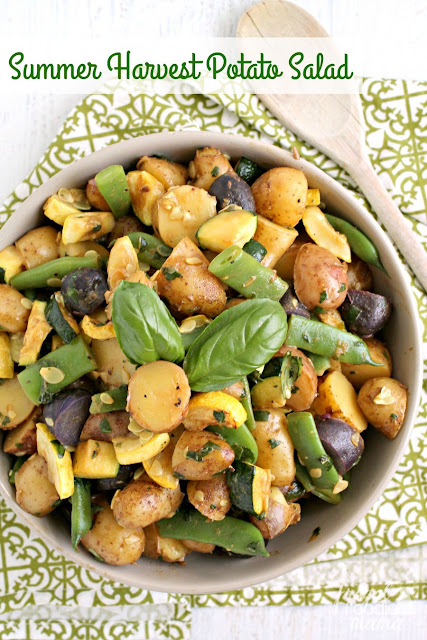 The freshest locally grown potatoes & veggies come together perfectly with a super simple 3 ingredient fresh basil dressing in this Summer Harvest Potato Salad.