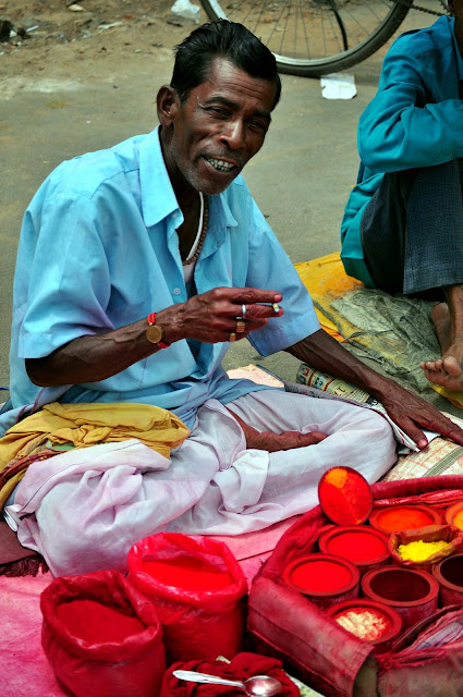 Puri temple Orissa Odisha Street Photography colorful Incredible India man selling sindoor