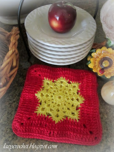 red and yellow crochet hot pad