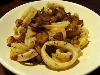 sauteed potatoes with prawns and squid