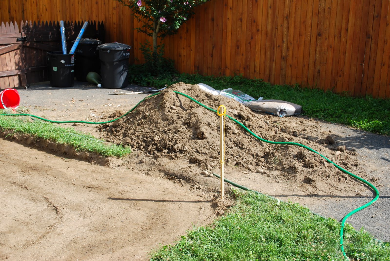 In the Little Yellow House Patio Building Digging out