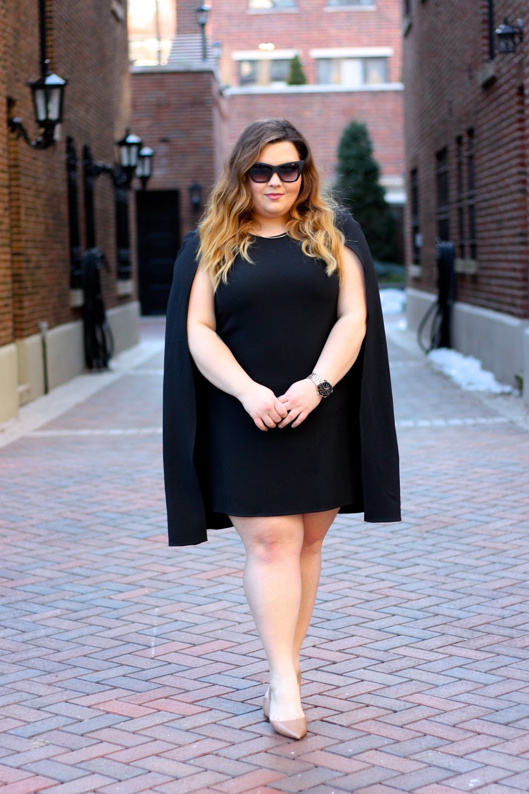 little black dress plus size, LBD, OOTD, natalie craig, cape dress, chicago, natalie in the city, plus size fashion, fashion blogger, forever 21 plus, capes, 2016 fashion trends, why men dont like certain trends, curves and confidence, quay sunglasses blogger, bold sunglasses for my face shape