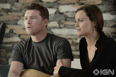 Taylor Schilling and Sam Worthington in The Titan (2018)