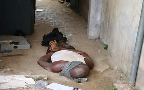 Tied and Bound to Death: Graphic Photo of a Security Guard Killed by Robbers in Edo