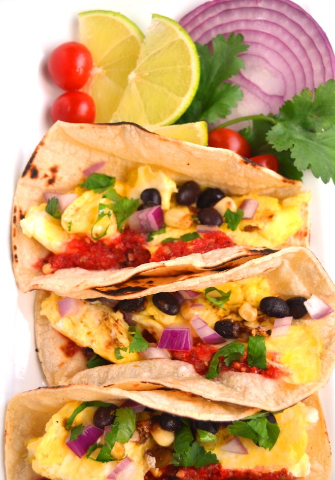 Breakfast Tacos with Fresh Tomato Salsa are ready in 10-minutes and are filled with scrambled eggs, black beans and homemade, flavorful salsa made with garden fresh tomatoes! www.nutritionistreviews.com