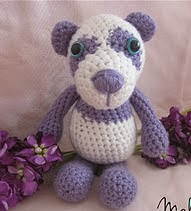 http://www.ravelry.com/patterns/library/precious-the-purple-panda