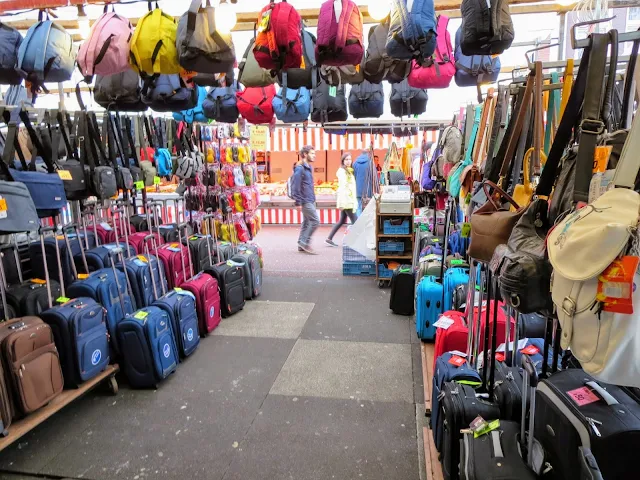 Top places to visit in the Netherlands: luggage stall at Albert Cuypmarkt in Amsterdam