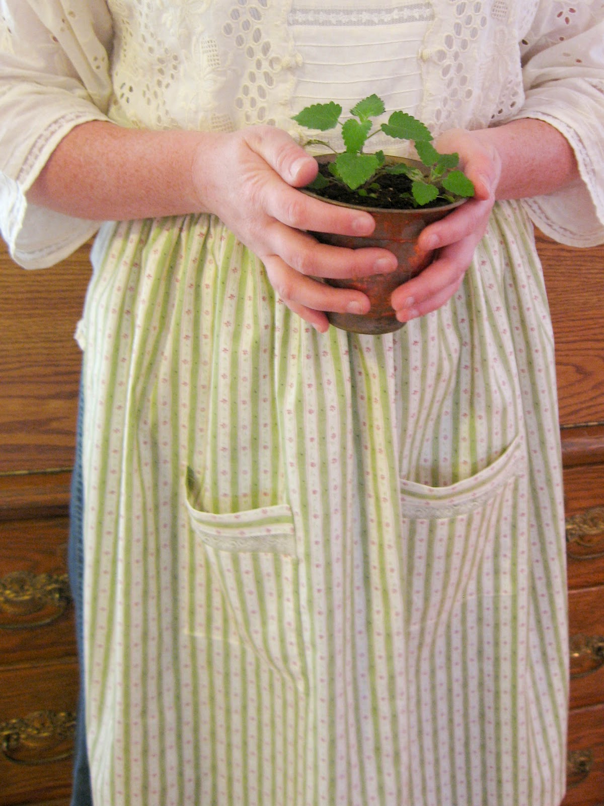 A Joyful Handmaiden Gardening in 'Tasha Tudor' Style