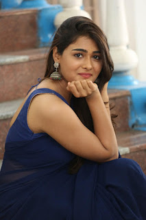 South actress shalini pandey sitting on steps and showing her sexy side view