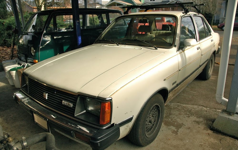 OLD PARKED CARS.: One Awesome Carport: 1981 Isuzu I-Mark diesel.