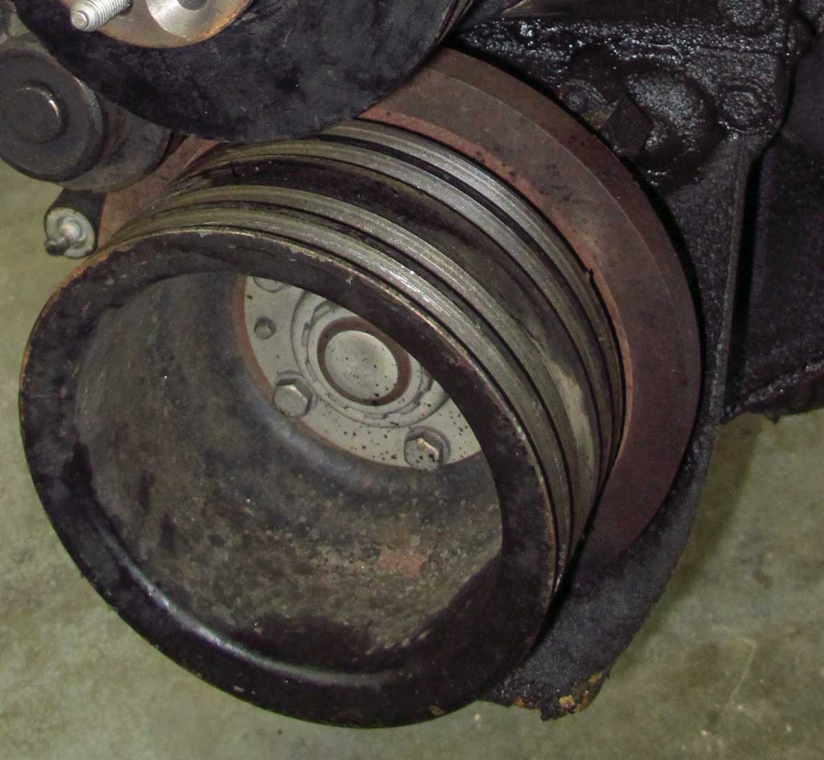 Engine failures when broken belts are sucked through the front seal