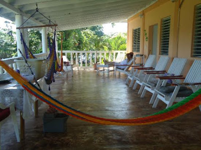 Remax Vip Belize: Sea Glass veranda where you can get community coffee