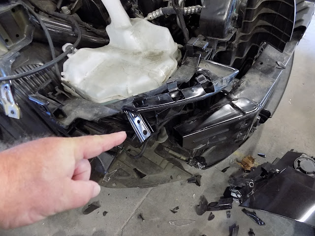 Hidden collision damage found & repaired inside the Kia Forte by Almost Everything Auto Body.