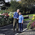 Couple who have brought colour to their village for 30 years by tending beautiful flower beds are given a week to remove them by council after ONE anonymous neighbour complained they were a danger to drivers