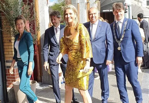 Queen Maxima wore Natan top and skirt, dress, Bodes and Bode juweliers earrings