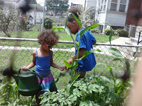 Little Green Thumbs helping in the Garden