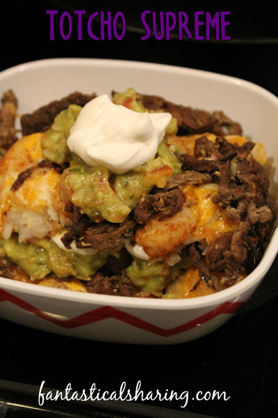 Totcho Supreme // Nachos just got better with this loaded tatortot version topped with delicious carne asada! #recipe #beef #nachos #tatortots