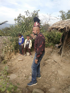 Self wearing Konyak tribe headgear of former head hunter Chopa