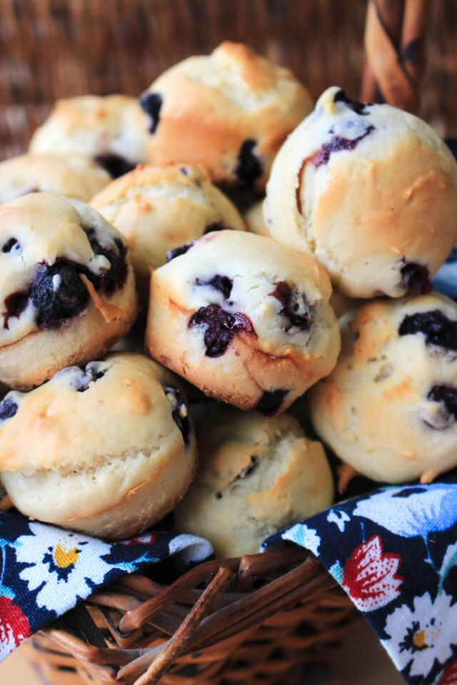 Two Bite Blueberry Muffins are simple and delicious basic mini muffins filled with sweet blueberries. They make a great breakfast, lunchbox addition or snack! #feastndevour 