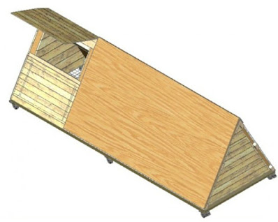 A mobile chicken coop, called a tractor, made in a triangular shape.