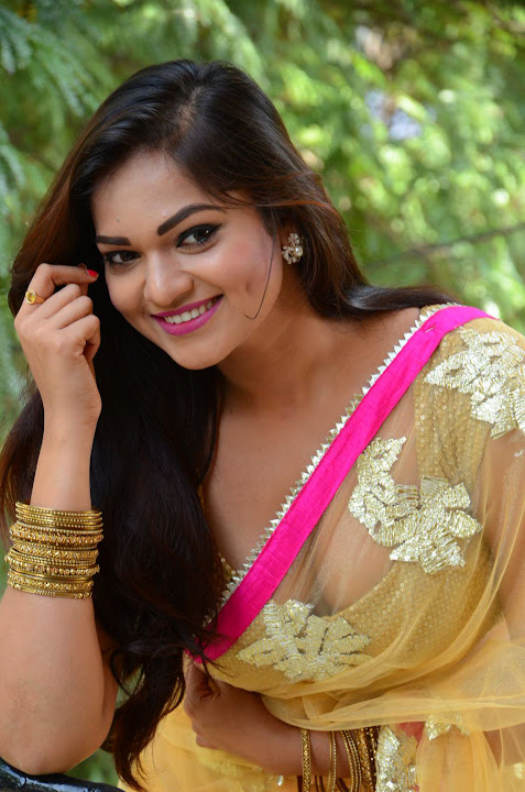 Ashwini Cleavage in Yellow Saree