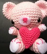 http://yarnplanet.tumblr.com/post/42592192162/so-i-made-a-valentines-day-bear-its-look-was