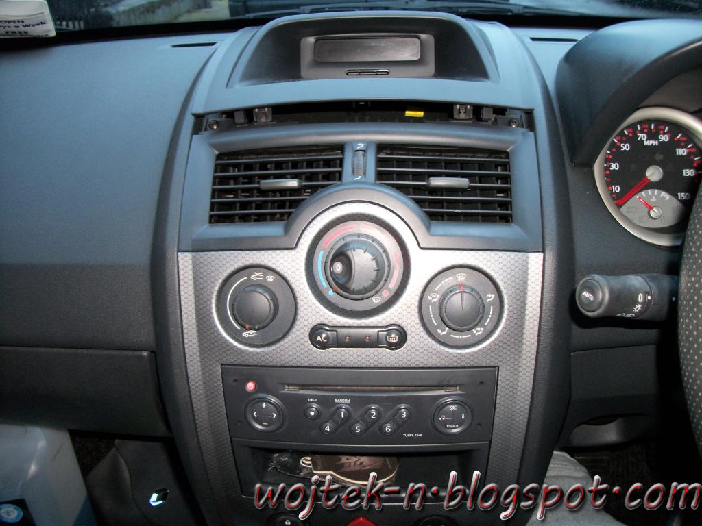 Central console has to be removed first. It is not so difficult, but take  some care to avoid damaging the pins/hooks