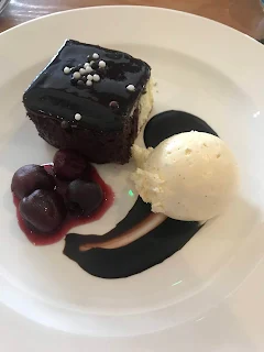 tripple chocolate moose with chantilly cream and cherries 