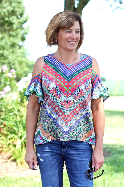 McCall's 7510 cold shoulder top made from a Mood Fabric's print