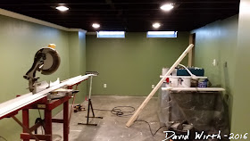 basement baseboard, crown molding, paint, finished basement