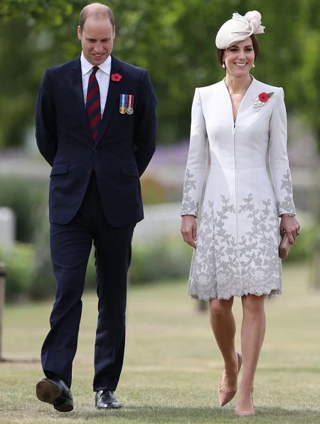 Kate Middleton wore Catherine Walker dress. Queen Mathilde wore Natan Dress. Prince Charles, Prince William and Catherine, Duchess of Cambridge