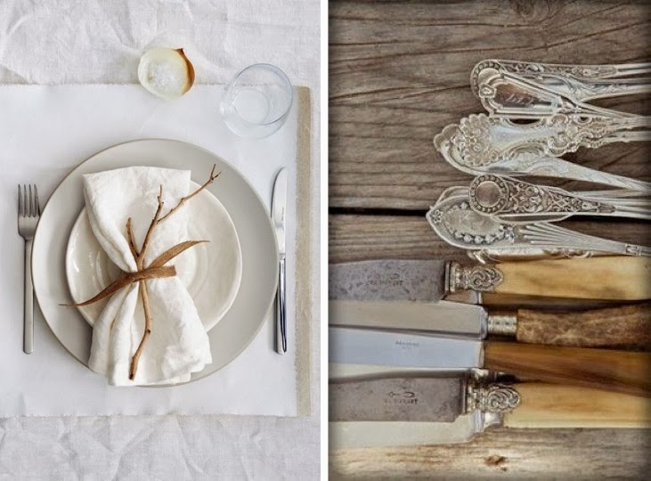mesa en blanco y cubiertos antiguos de plata