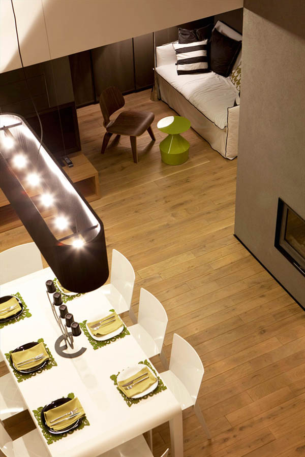 Paleta de Color Natural dan forma a este Espacioso Loft Sofisticado en