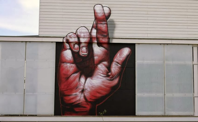 French Artist MTO paints a new Street Art mural entitled "Hope" in New Orleans, Louisiana. 3