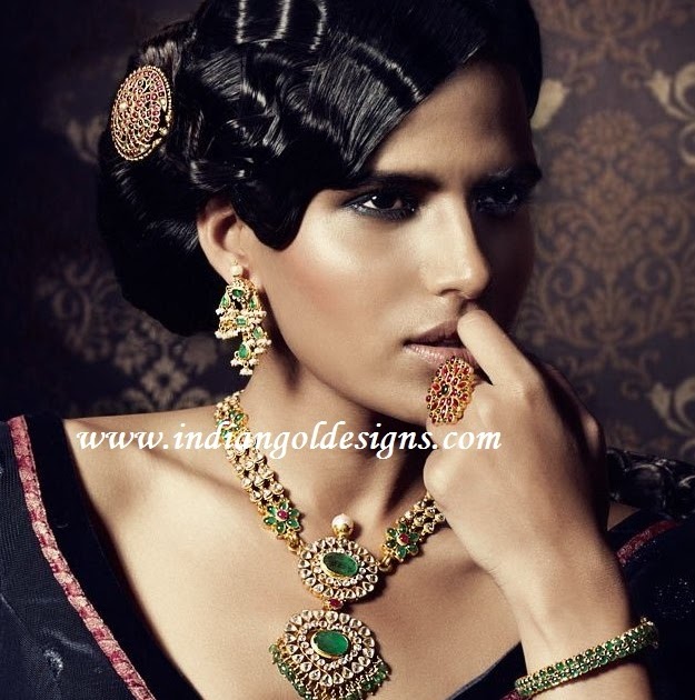 Gold and Diamond jewellery designs: kundan emerald gold bridal 