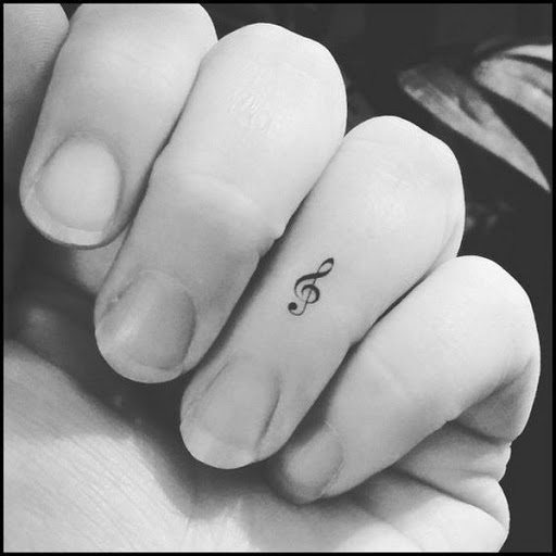 Pequena Nota de Música no Dedo