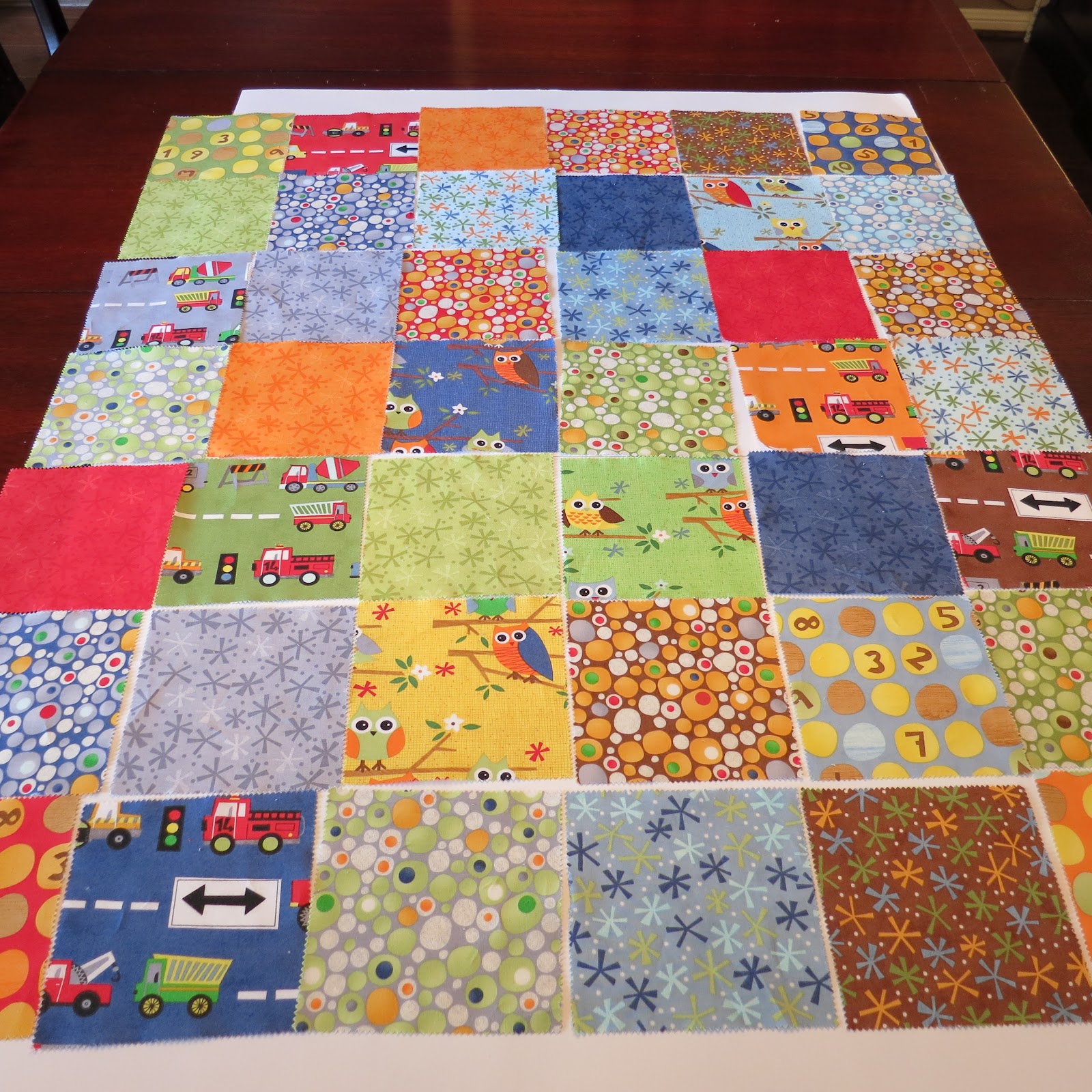 Simple Charm Pack Baby Quilt Pattern - Free Four Square Quilt Pattern