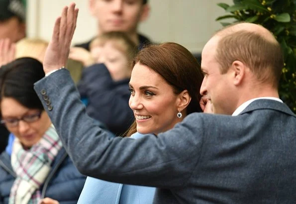 Kate Middleton wore Mulberry blue Ashleigh cape coat and a new Jenny Packham dress.The Duchess is wearing a cape coat by Mulberry
