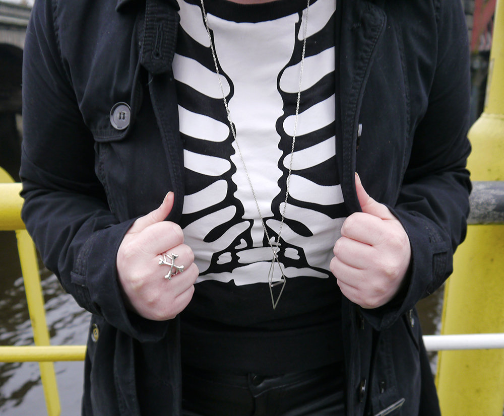 Halloween winter style and silver jewellery Styled by, Wardrobe Conversations, Scottish blogger, Dundee blogger, Glasgow, winter blues, winter outfit, monochrome outfit, Halloween outfit, skeleton jumper, H&M skeleton jumper, bobble hat, Tiger Stores winter hat, pom pom hat, blacn and white outfit, Scottish style, IOLLA, #seewithIOLLA, geometric jewellery, silver jewellery, Sunday style, trainers, pink trainers, charity shop style, accessorize necklace, #BMM, Bloody Mary Metal, Crossbones ring